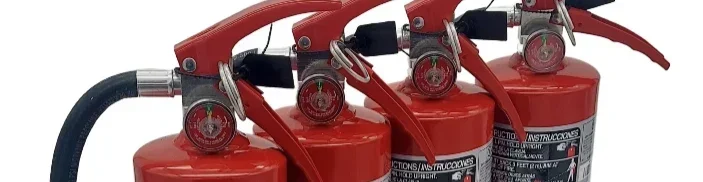 Four Sentry ABC fire extinguishers